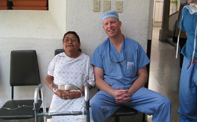 Bertrand Kaper M.D. With Patient from Operation Walk